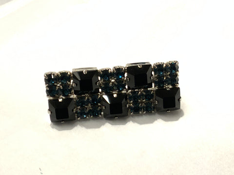 Toga brooch