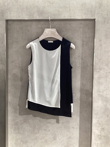 White sleeveless top